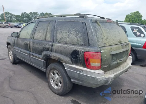 1999 Jeep Grand Cherokee Laredo from USA, damaged, VIN 1J4GW58S1XC525412
